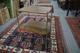 A brass and leather two-tier etagere.