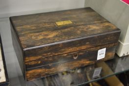 A good 19th century coromandel travelling or toiletry case.