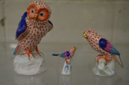 A Herend owl, 12cm high, parrot 8cm high and a bird on a branch, 5cm high, all with red fishnet
