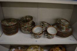 Quantity of famille rose cups, saucers, plates etc.