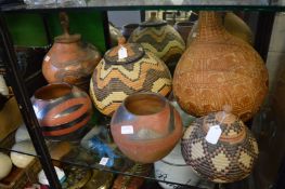 Various decorative African bowls, wicker baskets etc.