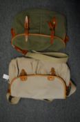 Two leather and canvas shoulder bags, one by Bleau de Chauffe.