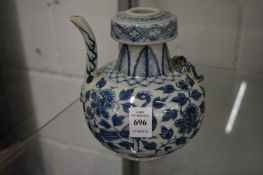 An unusual Chinese blue and white ewer with twin spout.