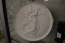A pair of large Royal Copenhagen bisque porcelain circular moulded classical style plaques.