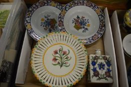 An Iznik style bottle, a majolica dish and a pair of soup bowls.