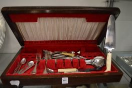 A cutlery canteen containing various flatware.