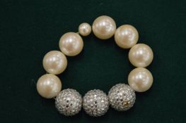 Pearl and diamante bracelet.