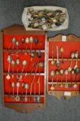 A quantity of collectors spoons.