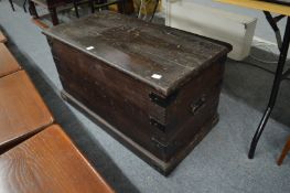A stained pine trunk.