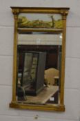 Decorative 19th century gilt framed pier mirror with a verre eglomise panel to the upper section.
