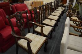 A set of eight Chippendale style mahogany dining chairs, two with arms (faults).