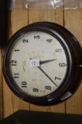 A Smiths bakelite wall clock, a Geecen Limited Speedograph and another item.