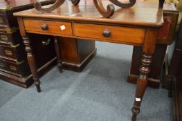 A Victorian mahogany two drawer side table.