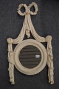 Two decorative small mirrors.
