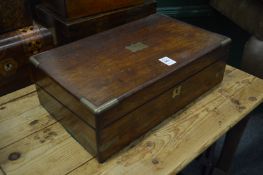 A Victorian brass bound rosewood writing slope.