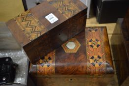 Two inlaid walnut boxes.