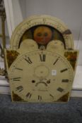 A 19th century painted eight day clock dial with moon phase movement.