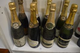 Eight bottles of old champagne.