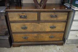 A Victorian walnut chest of drawers.