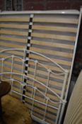 A 5ft Victorian style white painted metal bed frame with John Lewis mattress (appears little used).