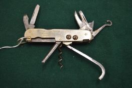 A pocket knife, lacking main blade.