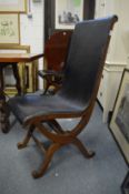 A set of six Pierre Lottier oak and leather upholstered slipper style dining chairs.
