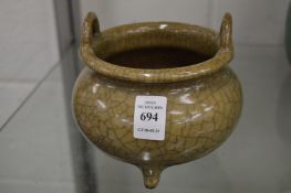 A Chinese crackle glazed censer.