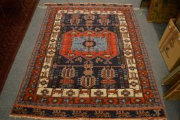 A Persian rug with all over geometric decoration, 195cm x 145cm.