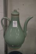 A Chinese celadon glazed ewer.