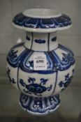 A Chinese blue and white vase.