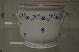 A Herend cachepot painted with small blue flowers, 14.5cm high.