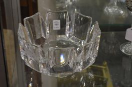 A stylish heavy clear glass bowl.