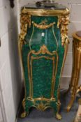 A good large pair of impressive faux malachite, ormolu and marble top pedestals.