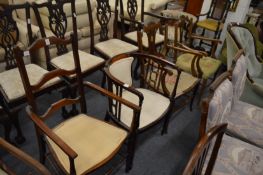 Two mahogany occasional chairs and a pair of Edwardian mahogany armchairs.