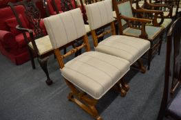 A good pair of oak framed and upholstered side or dining chairs.