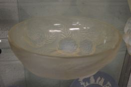 A Lalique opaque glass circular bowl moulded with flowers (rim chip).