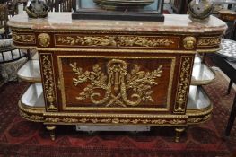 A highly impressive French style mahogany, ormolu and marble commode/side cabinet.