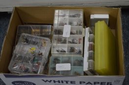 A group of fly fishing flies some tied by Megan Boyd fly tyer to His Majesty the King.