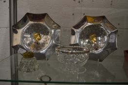A cut glass bowl with silver rim, pair of Royal Commemorative white metal dishes and an inkwell.