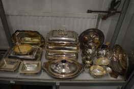 A quantity of plated items to include entree dishes and covers.