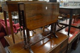 A Victorian inlaid rosewood Sutherland table.