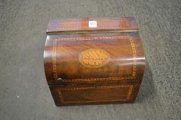 An Edwardian inlaid mahogany liqueur set, the domed lid opening to reveal six gilt decorated