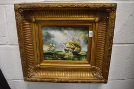 Sailing ships in a choppy sea, oil on board in a decorative gilt frame.