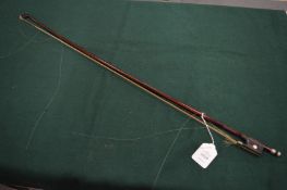 A violin bow stamped Schultz.