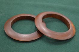 A pair of wooden bangles.