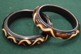 Two lacquer bangles.