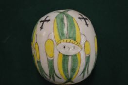 An Eastern pottery ball shaped hanging.