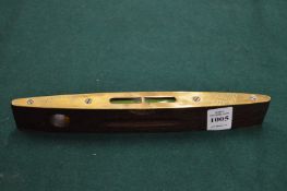 A boat shaped spirit level.