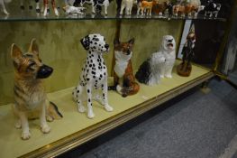 A collection of large Beswick animals to include an alsatian, a dalmatian, a fox, two old English