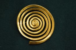 Decorative gilt metal brooch.